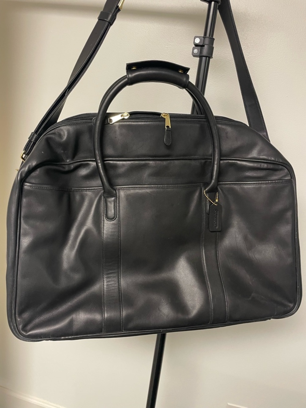 Coach Black Leather Travel Bag with Gold-Tone Hardware